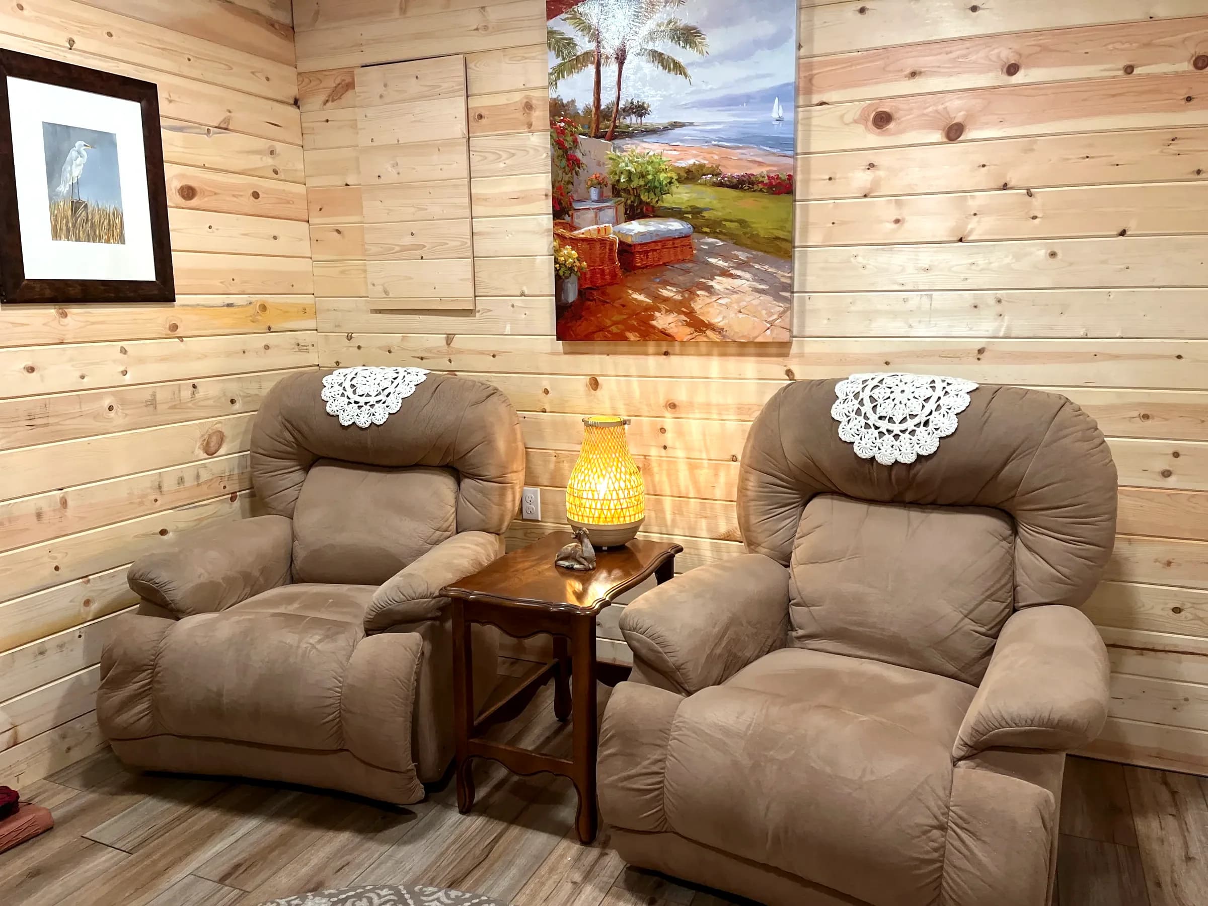 Prayer room with brown chairs